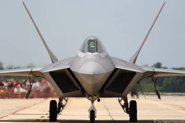 F-22 Raptor taking off runway in direction of camera